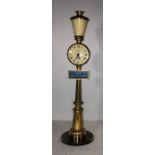 A gilt metal and black JAEGER RUE DE LA PAIX STREET LAMP DESK CLOCK. Movement: Manual wind 8 day