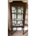 Edwardian mahogany inlaid single door display cabinet. 137cms h, 61cms w, 32cms d.