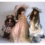 Three good quality modern porcelain headed dolls including Leonardos collectors doll. H-62cms