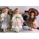 Six good quality modern porcelain headed dolls.- H - 44cms.