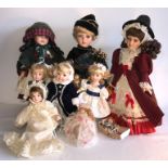 Eight good quality modern porcelain headed dolls and a rag doll including one by Maureen Thomas,