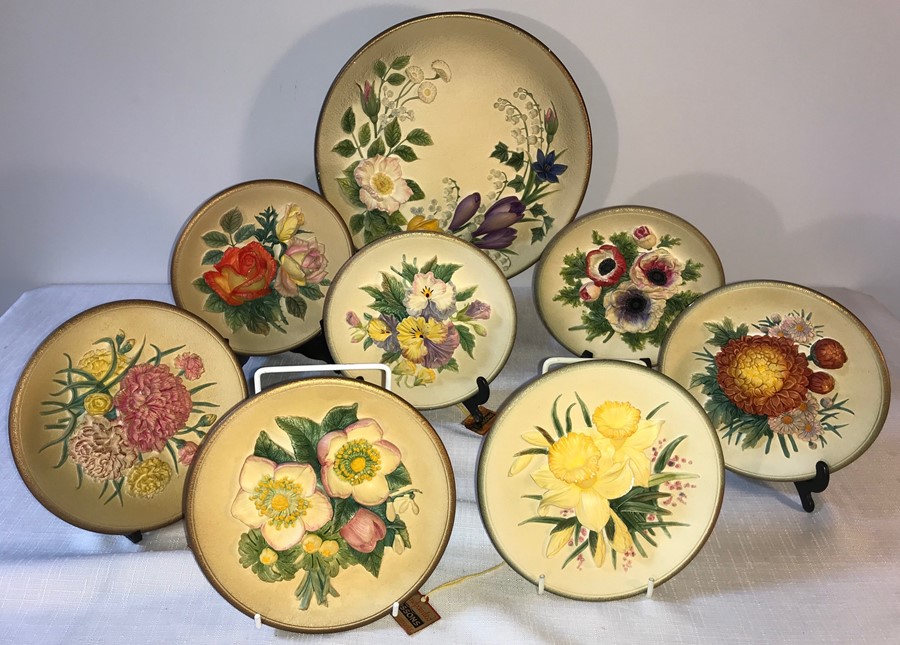 A collection of Bossons handpainted plates depicting flowers. Excellent condition. (10)