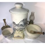Lurpak butter dish, bread crock, chip to front, 2 brass lamps, a blue and white bowl and pestle