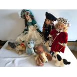 Three good quality modern porcelain headed dolls and a collection of teddies.