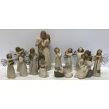 A collection of Willow Tree carved stone figures by Susan Lordi.
