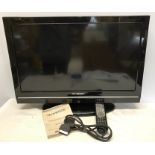 Techwood 26inch HD tv with built-in remote, scart lead and instructions booklet. Model number