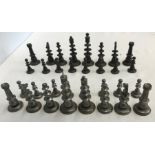 A complete pewter chess set. King 10cms h.
