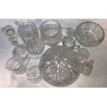 A quantity of cut and moulded glass including clock, bell, bowl, jug, lamp shade etc.