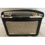 Bush TR130 portable radio, black leatherette case.