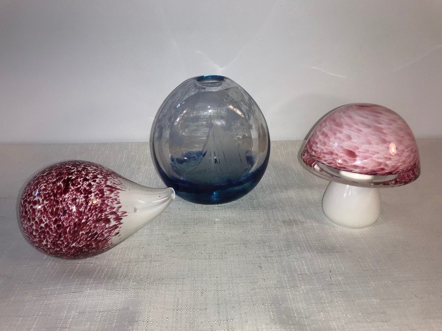 Two Wedgwood glass paperweights, Mushroom, Hedgehog and a Caithness glass vase, yacht.