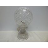 A cut glass table lamp with glass globe shade approx 35cms t, minor chips to base rim.