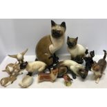 Eleven various ceramic animals including cats, some a/f, dog, swan, Beswick bird a/f to tail.