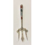 A Scottish agate and silver pickle fork with four Scottish agate pieces to the handle to one side