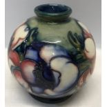 Moorcroft Anemone on blue ground round vase approx 10.5cms t