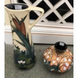 Moorcroft vase, limited edition 460/500, 12cms h together with Moorcroft jug, 24cms h. Jug, glaze