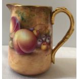 Royal Worcester fruit painted jug, gilded to the interior, signed P. English, 10cms h, good