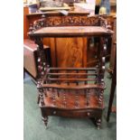 19TH CENTURY ROSEWOOD SERPENTINE FRONTED WHAT-NOT/CANTERBURY with single drawer, standing on