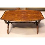 A RARE EARLY 20TH CENTURY ‘OYSTER VENEERED’ COFFEE TABLE, with raised scalloped gallery rim, the top