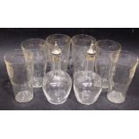 A SET OF 6 GLASSES & A PAIR OF GLASS VINEGARETTE BOTTLES, having silver plated cork stoppers, each