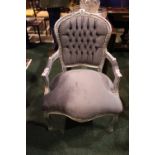 A CONTEMPORARY LOUIS XV STYLE CHAIR, with grey fabric upholstery and silver coloured carved wooden