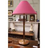 A MID CENTURY MODERN TABLE LAMP, with wooden and metal stand, with shade, 26" tall approx