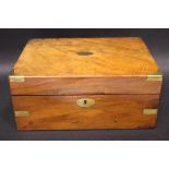 A BRASS BOUND WRITING BOX, with felt covered writing slope, opens to reveal compartments within, 12"