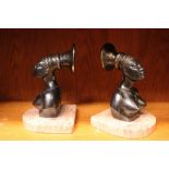 A PAIR OF ART DECO STYLE 'AFRICANIST' BOOKENDS, with two female figures of cast Spelter on pink