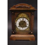 AN ANSONIA WALL CLOCK, with oak case, early 20th century, 15" x 10" x 6" approx