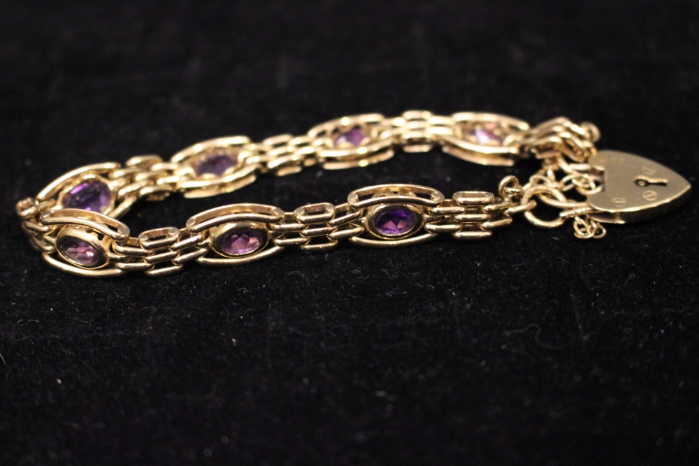 A 9CT GOLD LINK BRACELET, with heart shaped lock and pink stones - Image 3 of 3