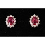 A PAIR OF 18CT WHITE GOLD RUBY & DIAMOND CLUSTER EARRINGS, ruby 2.2cts, 1.00ct diamonds