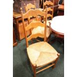 A SET OF 4 OAK DINING CHAIRS / KITCHEN CHAIRS, with rush wicker seats