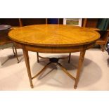 EARLY 20TH CENTURY OVAL SHAPED CENTRE TABLE, on tapering leg, with spade feet, having X-stretcher