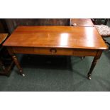 A MAHOGANY SOFA / HALL / DINING TABLE, with turned leg on castors, a single frieze drawer with