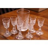 A SET OF 6 WATERFORD SHERRY GLASSES, with another Waterford glass/vase