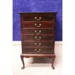 AN EARLY 20TH CENTURY, "STONES PATENT" MUSIC CABINET, with 6 drop front drawers, each with inlaid