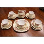 A BONE CHINA TEA SET, Colclough Rose Decoration, (5) cups, (6) saucers, (5) plates, (1) sandwich