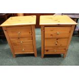 A PAIR OF PINE BED SIDE LOCKERS / CABINETS, with three drawers, 26" x 18" x 5" approx