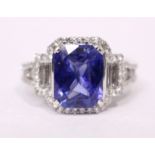 AN 18CT WHITE GOLD BURMESE SAPPHIRE & DIAMOND CLUSTER RING, 3.40ct sapphire, 1.25cts diamond