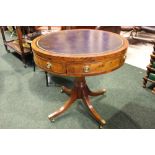 GOOD QUALITY MAHOGANY MINIATURE DRUM TABLE, with leather inset, on downswept feet, terminating in