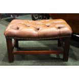 MAHOGANY AND LEATHER BUTTONED FOOT STOOL in Regency style, 22" wide x 15" deep x 13" high