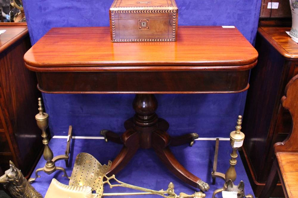 A VERY FINE MAHOGANY FOLD OVER TEA TABLE, raised on turned baluster shaped column support, with four