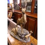 BRONZE GROUP OF DEER ON ROCKS, 24" high x 22" wide approx.