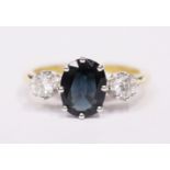 AN 18CT YELLOW GOLD SAPPHIRE & DIAMOND 3 STONE RING