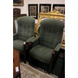 A PAIR OF MODERN RECLINER ARM CHAIRS