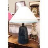A CERAMIC TABLE LAMP, with blue drip glaze and shade, 29" tall approx
