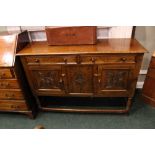 A GOOD JACOBEAN REVIVAL STYLE OAK SIDE BOARD, with 2 drawers over a two door cabinet beneath, having