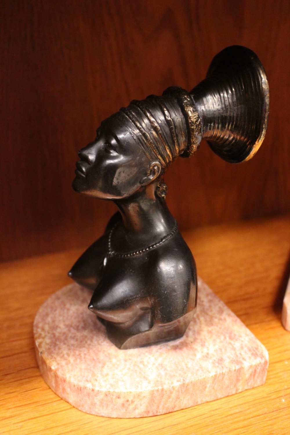 A PAIR OF ART DECO STYLE 'AFRICANIST' BOOKENDS, with two female figures of cast Spelter on pink - Image 2 of 2