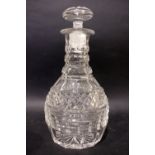 AN IRISH 20TH CENTURY CUT GLASS DECANTER, with stopper, triple ring neck, broad fluted base and