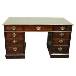 A VERY FINE MAHOGANY PEDESTAL DESK, with green leatherette top, over 3 frieze drawers and a pair