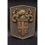A HERALDIC WALL PLAQUE, painted, 17.5" x 13" approx